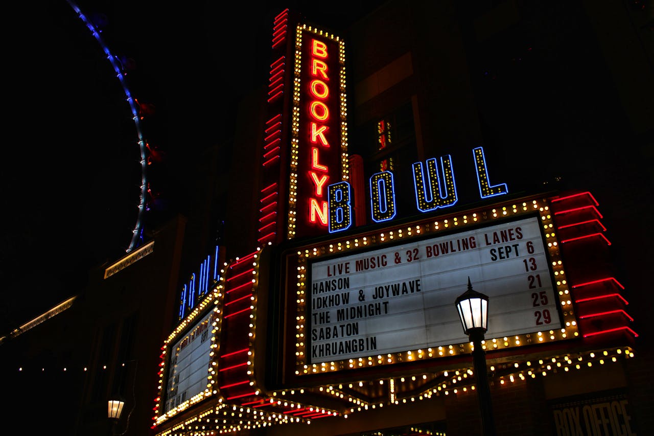 Neon-lit marquee of Brooklyn Bowl in Las Vegas, showcasing upcoming events.